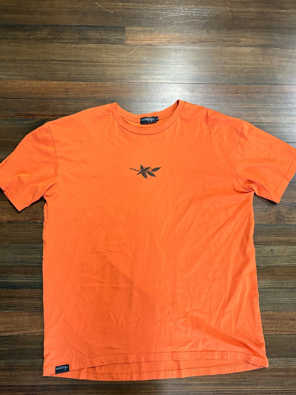 Men's Orange Short-Sleeve Tee with Subtle Leaf Logo